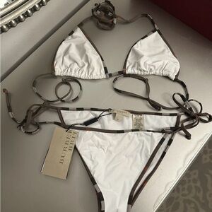 NWT Burberry white bikini with signature Burberry check accents.
Comes with box